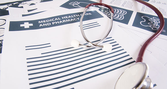 stethoscope on medical documents highlighting healthcare and pharmacy two important aspects of health management